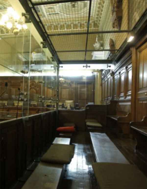 Glass dock in courtroom